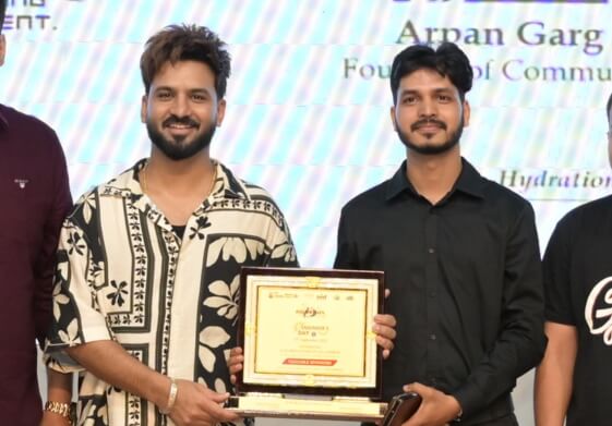 Anish Kumar receiving Engineer of the Year Award from Aman Aujla