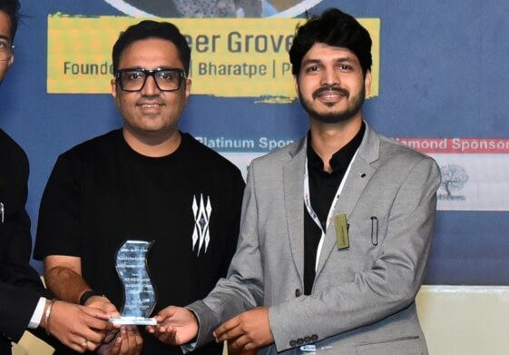 Anish Kumar receiving Best Entrepreneur Award 2024 from Ashneer Grover